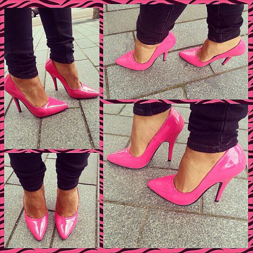 Roze pumps met klassieke spitse neus en hoge naaldhak