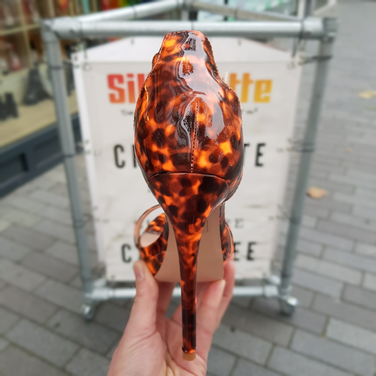 Oranje sandalen met hak en vlekken | Silhouette