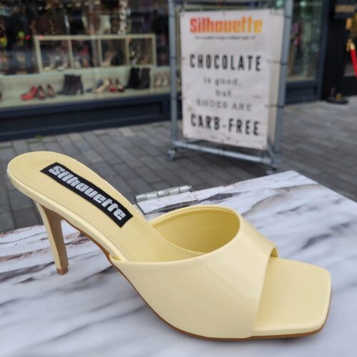 Zachtgele slippers met hoge hak | Silhouette